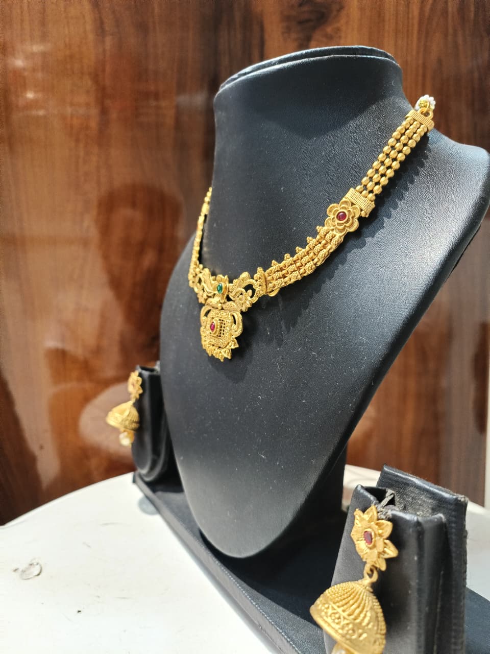 Gold necklace and earrings set