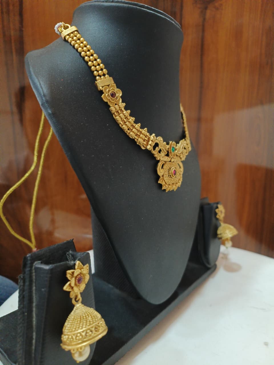 Gold necklace and earrings set